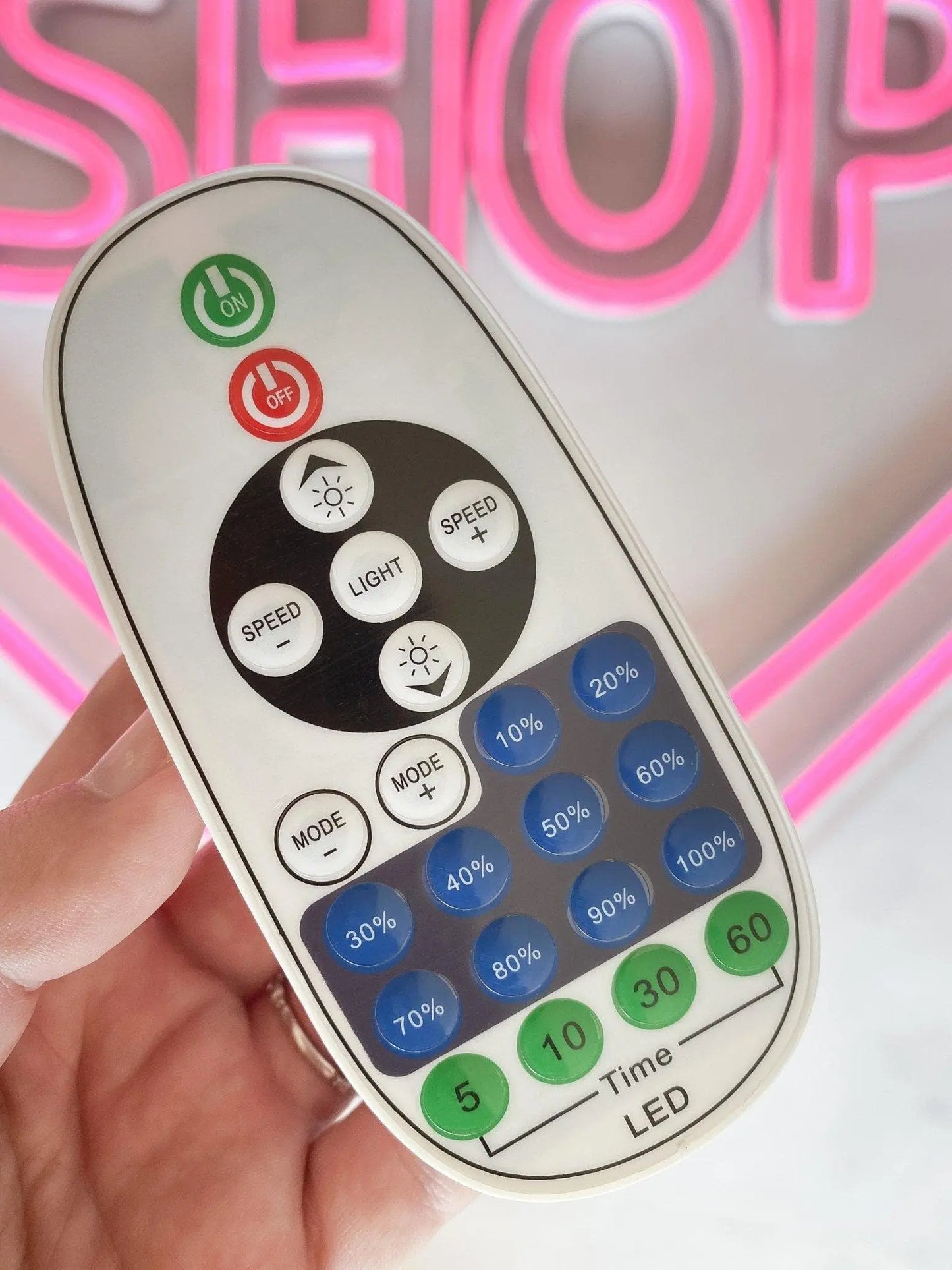 Dimmer remote for LED neon sign.