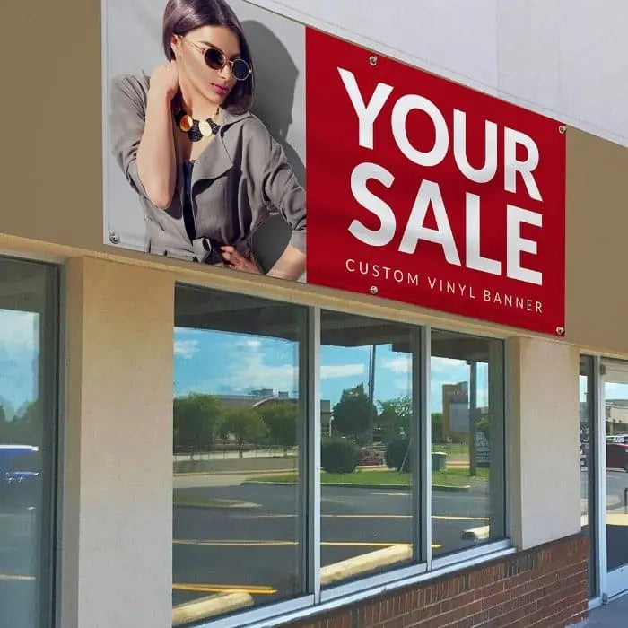 custom sale banner for business displayed on a store front over window