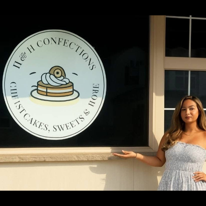 Outdoor business sign round on storefront bakery custom logo with business owner